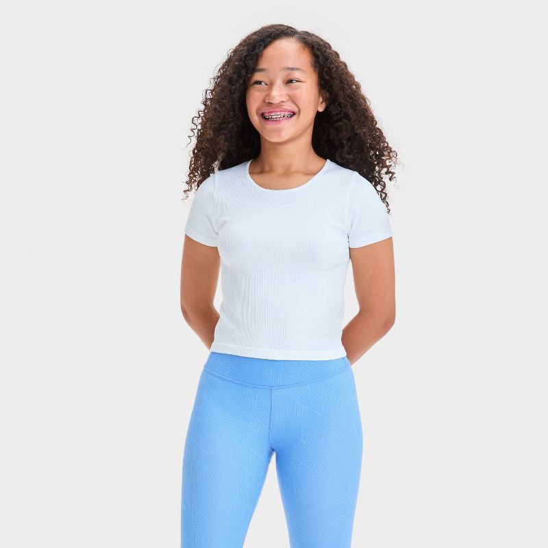 slide 1 of 3, Girls' Seamless Crop T-Shirt - All In Motion™ White L: Fitted Knit Pullover, Short Sleeve, 1 ct
