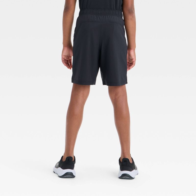 slide 2 of 3, Boys' Active Light Woven Shorts - All In Motion™ Black M: Recycled Polyester, Spandex, UPF 50+, Zippered Pocket, Elastic Waistband, 1 ct