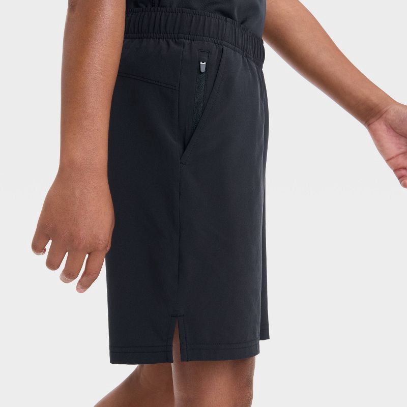 slide 3 of 3, Boys' Active Light Woven Shorts - All In Motion™ Black M: Recycled Polyester, Spandex, UPF 50+, Zippered Pocket, Elastic Waistband, 1 ct