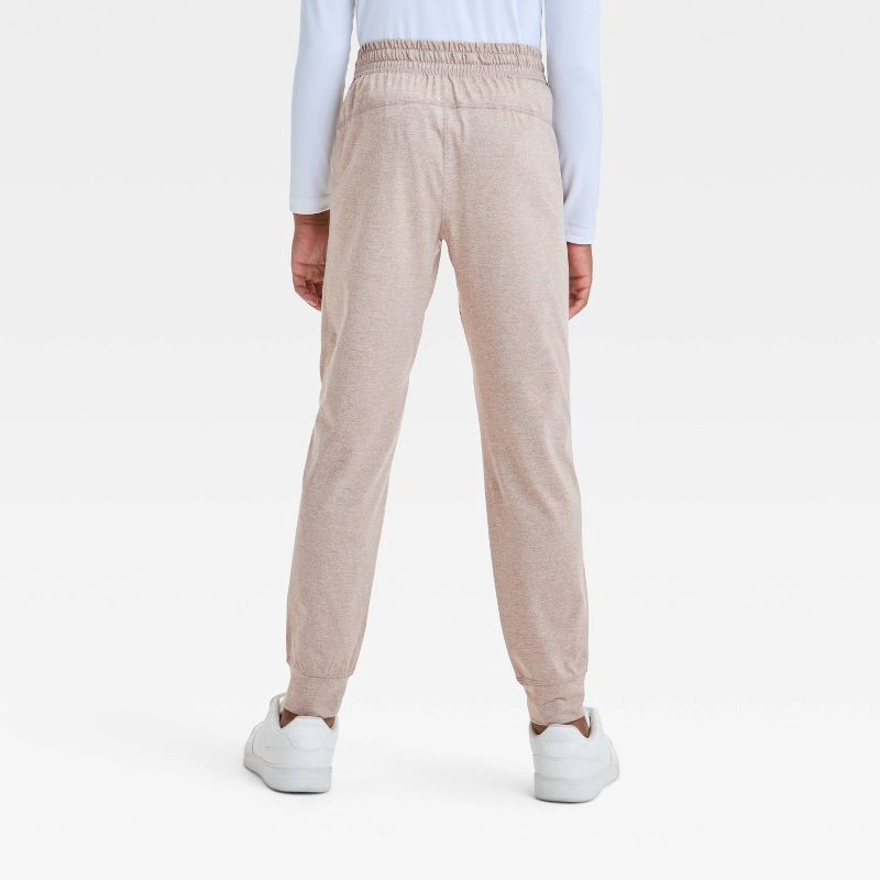 slide 2 of 3, Boys' Soft Stretch Jogger Pants - All In Motion™ Tan XS: Recycled Polyester, Spandex, Zippered Pocket, Machine Washable, 1 ct