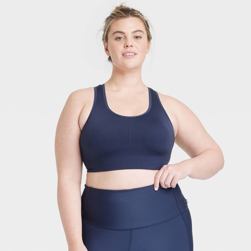 slide 1 of 6, Women's Seamless Medium Support Racerback Sports Bra - All In Motion™ Navy Blue L: Removable Padding, 1 ct