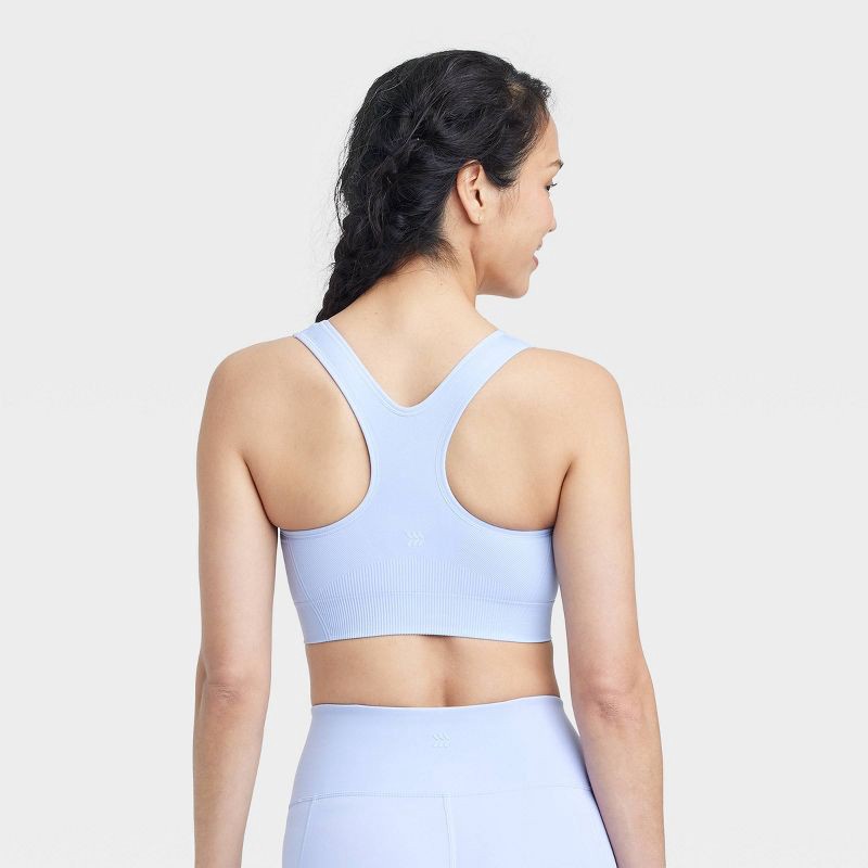 slide 2 of 5, Women's Seamless Medium Support Racerback Sports Bra - All In Motion™ Periwinkle Blue S: Moisture Wicking, Removable Cup, 1 ct