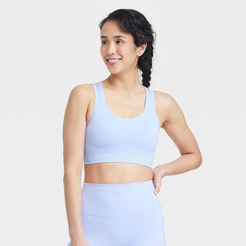 slide 1 of 5, Women's Seamless Medium Support Racerback Sports Bra - All In Motion™ Periwinkle Blue S: Moisture Wicking, Removable Cup, 1 ct