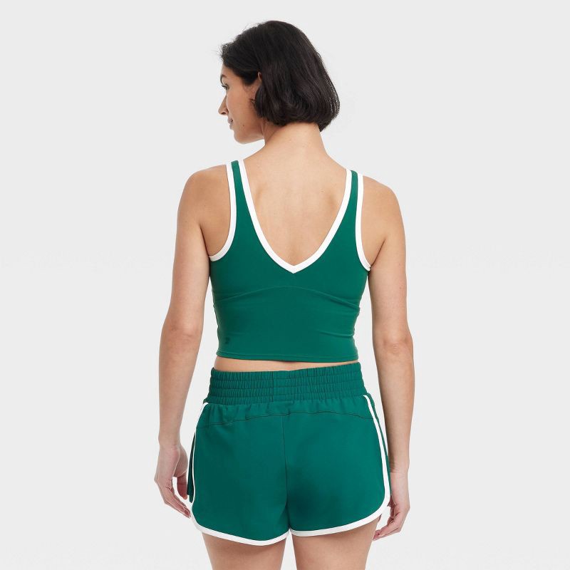 slide 2 of 5, Women's Everyday Soft Light Support Contrast V Neck Cropped Sports Bra - All In Motion™ Dark Green S: Moisture Wicking, Quick Drying, 1 ct