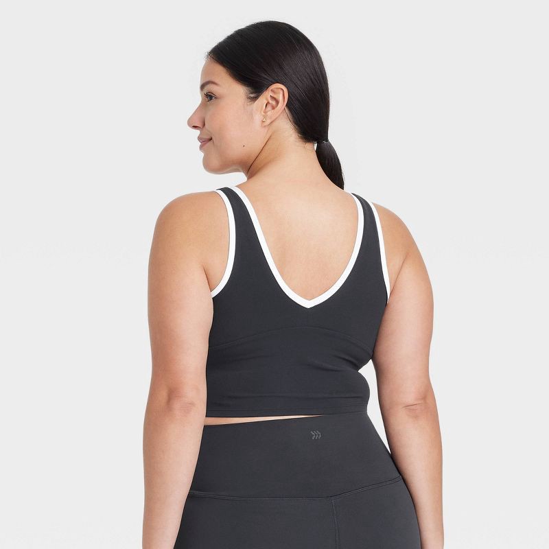 slide 4 of 5, Women's Everyday Soft Light Support Contrast V Neck Cropped Sports Bra - All In Motion™ Black XL: Moisture Wicking, Removable Padding, 1 ct