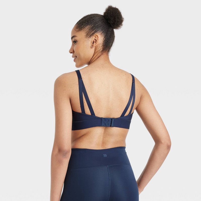 slide 2 of 5, Women's Effortless Medium Support Sports Bra - All In Motion™ Navy Blue XS: Moisture Wicking, Quick Drying, Adjustable Straps, 1 ct