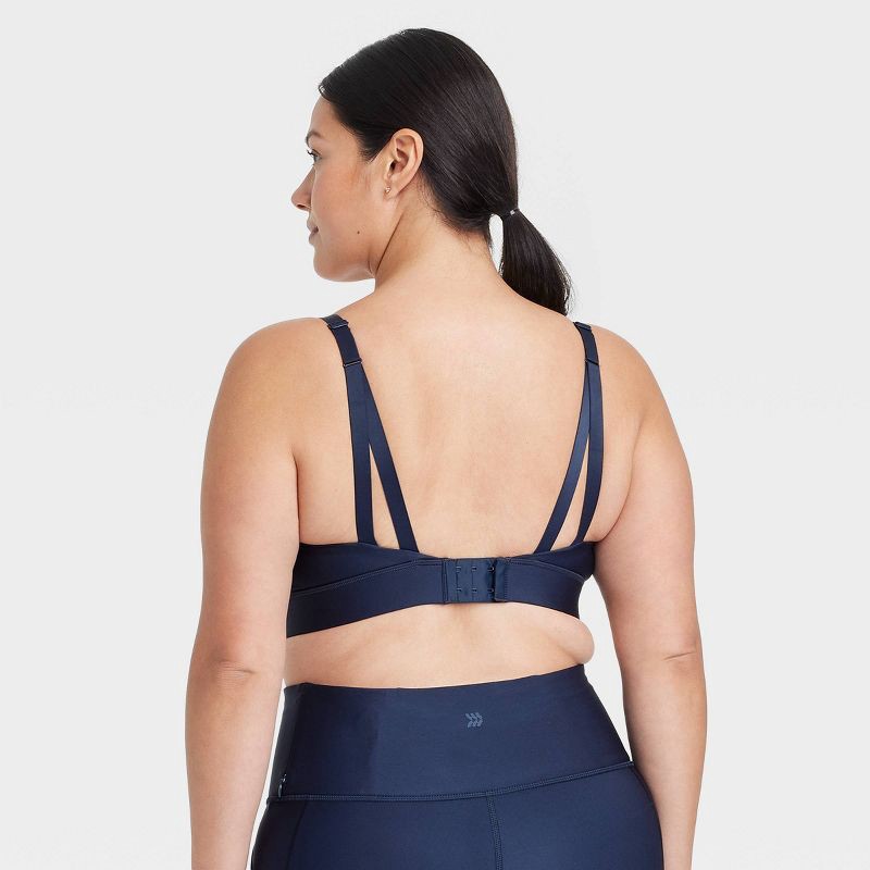 slide 4 of 5, Women's Effortless Medium Support Sports Bra - All In Motion™ Navy Blue XS: Moisture Wicking, Quick Drying, Adjustable Straps, 1 ct