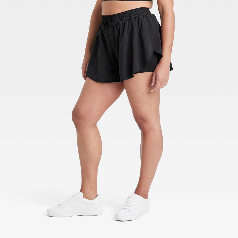 slide 3 of 6, Women's Woven High-Rise Flutter Shorts 2.5" - All In Motion Black L, 1 ct
