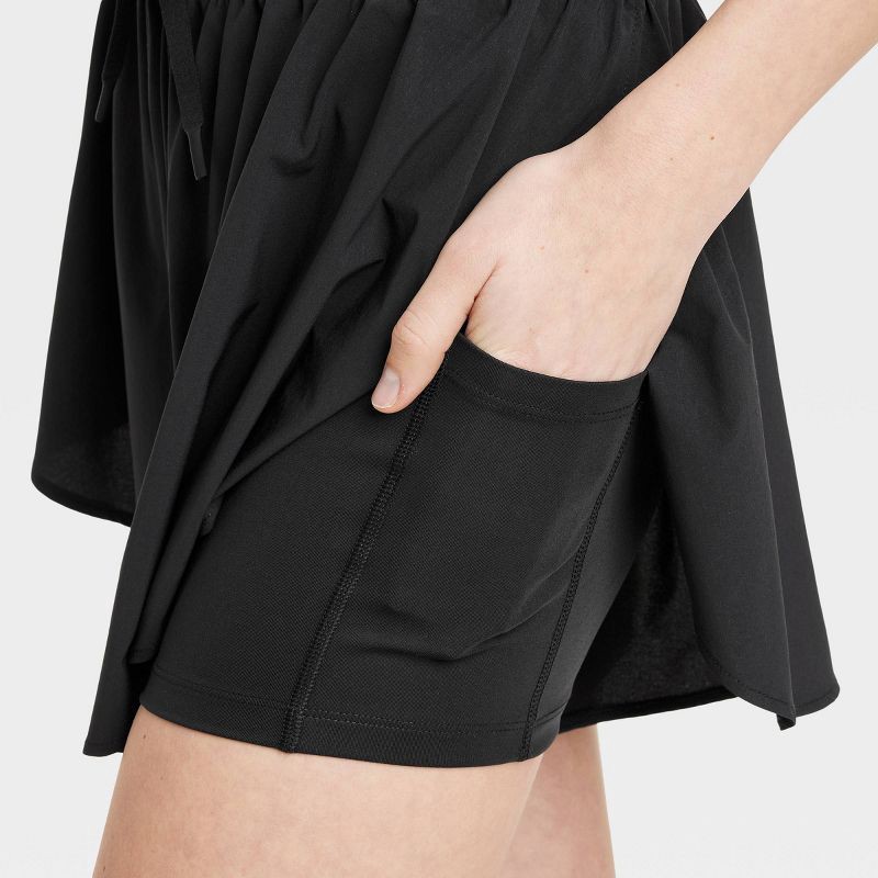 slide 6 of 6, Women's Woven High-Rise Flutter Shorts 2.5" - All In Motion Black L, 1 ct