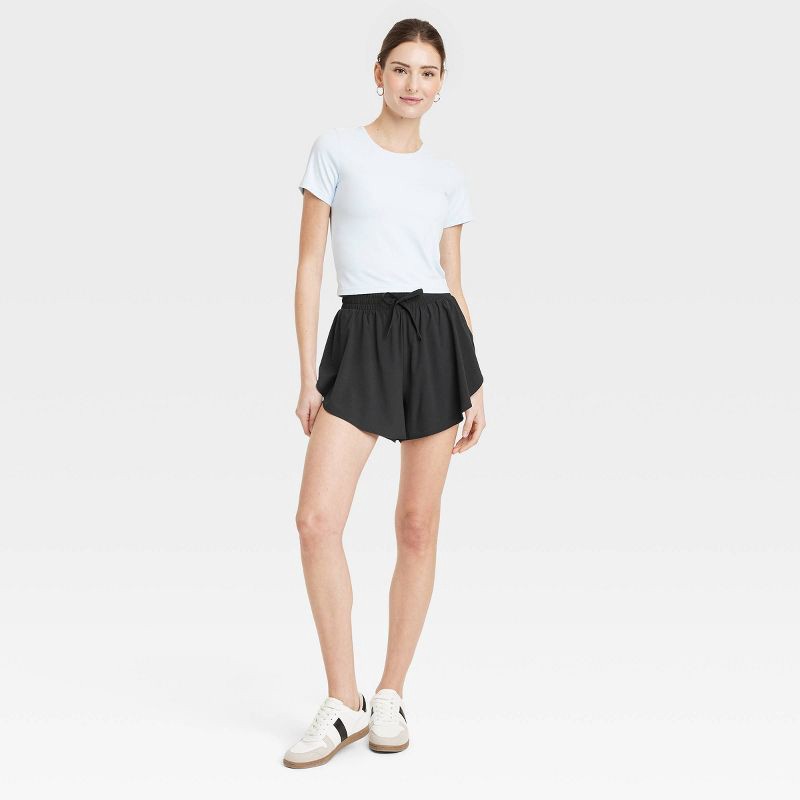 slide 5 of 6, Women's Woven High-Rise Flutter Shorts 3" - All In Motion Black XL, 1 ct