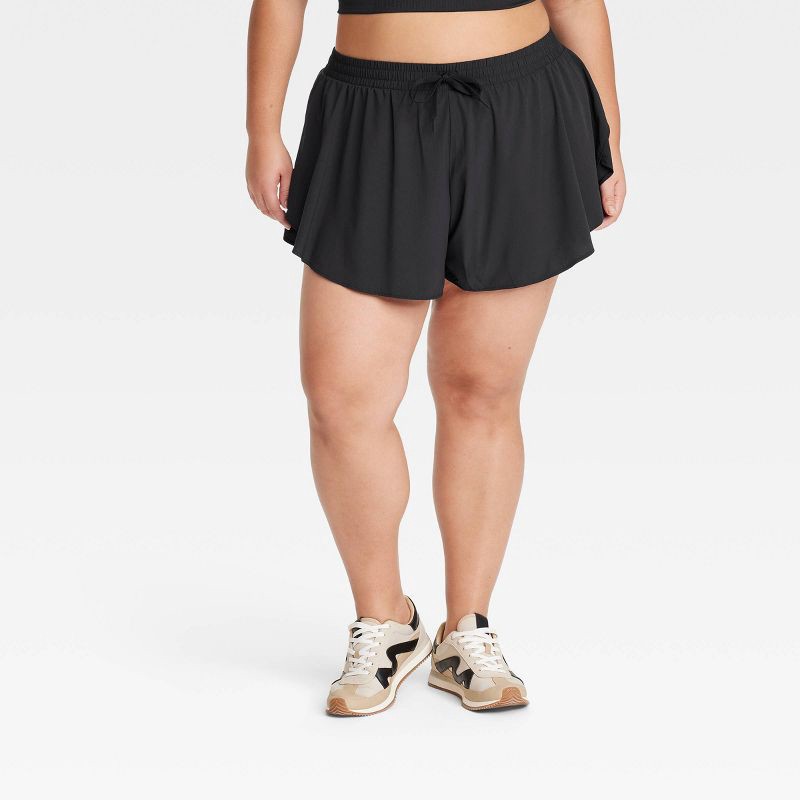 slide 1 of 4, Women's Woven High-Rise Flutter Shorts 2.5" - All In Motion Black XXL: Moisture Wicking, Quick Dry, Built-in Shorts, 1 ct