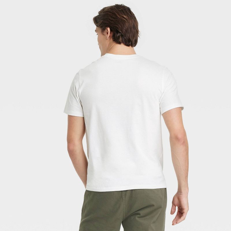 slide 2 of 3, Men's Short Sleeve Graphic T-Shirt - Goodfellow & Co™ Cream XL: Hearts Pattern,, 1 ct