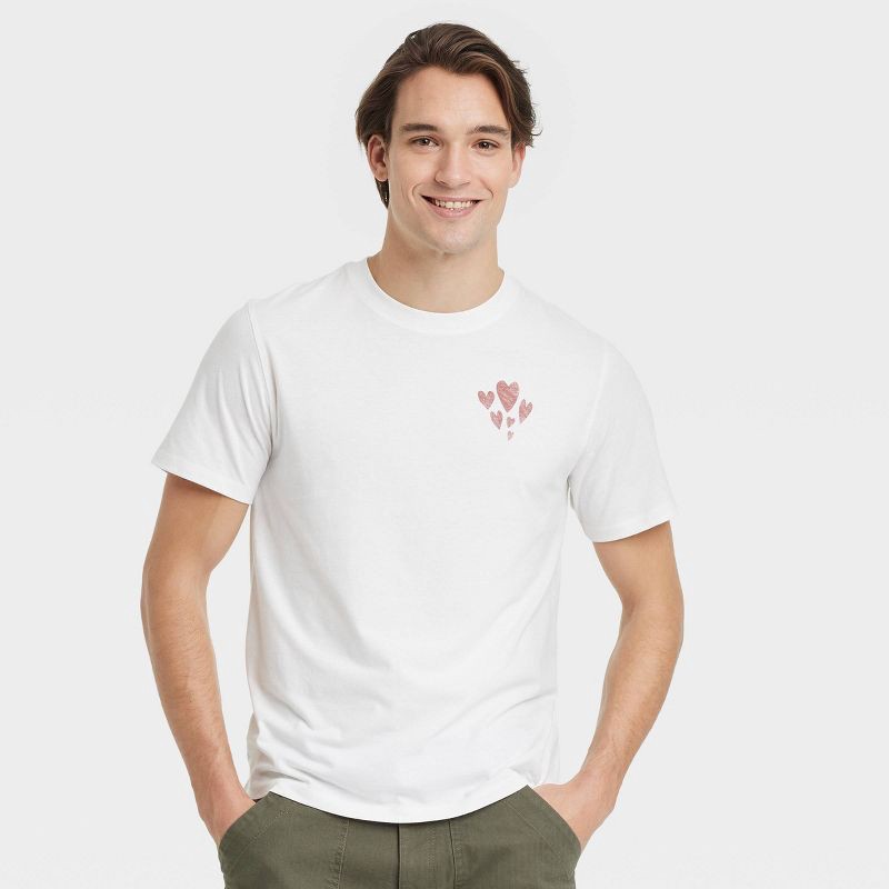 slide 1 of 3, Men's Short Sleeve Graphic T-Shirt - Goodfellow & Co™ Cream XL: Hearts Pattern,, 1 ct