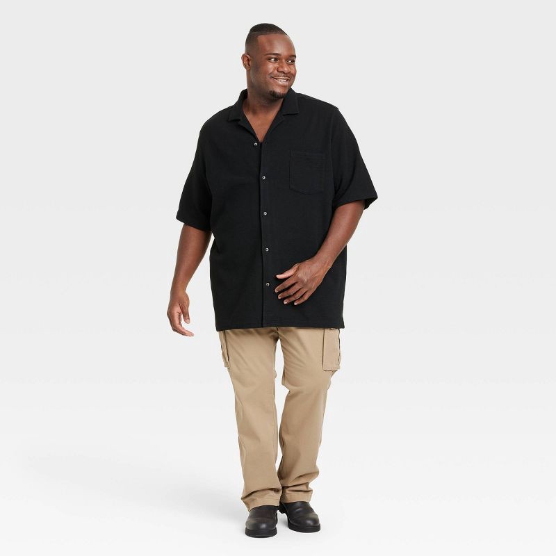 slide 3 of 3, Men's Short Sleeve Knit Button-Down Shirt - Goodfellow & Co™ Black S: Front Pocket, Doubleknit, 1 ct