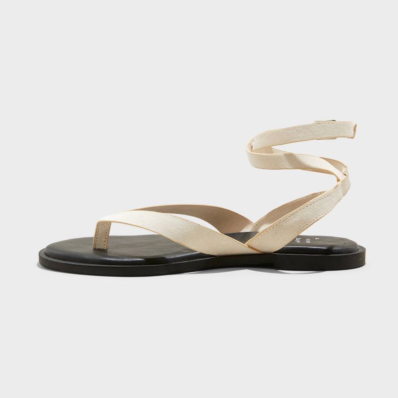 slide 2 of 4, Women's Tarin Ankle Wrap Thong Sandals - A New Day™ Cream 10: Cushioned Footbed, Adjustable Ankle Strap, 1 ct