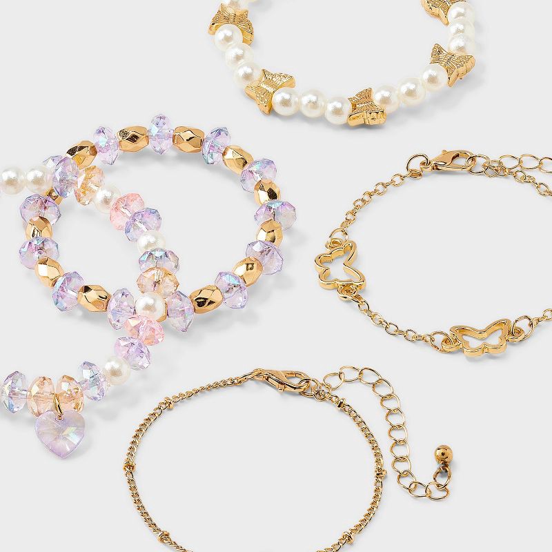 slide 3 of 3, Girls' 5pk Flowers and Butterflies Bracelet Set - Cat & Jack™️ Gold/Purple: Beaded, Chain, Stretch Styles, 5 ct