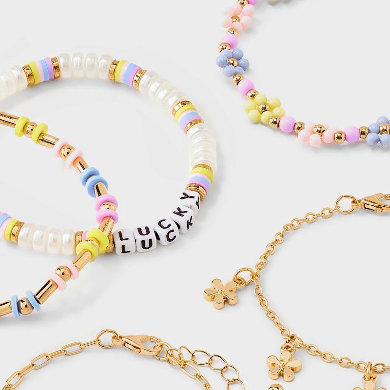 slide 3 of 3, Girls' 5pk Daisies Bracelet - art class™: Beaded, Chain, Stretch, Lobster Claw Clasp, 6.5" Length, 5 ct