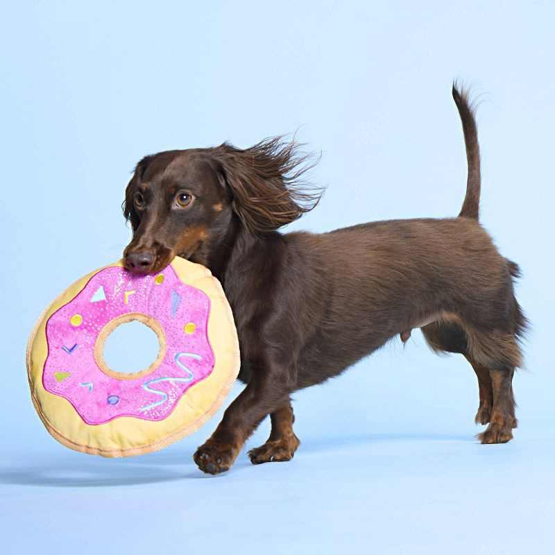 slide 5 of 5, BARK Doggy Bag Delivery Donut Dog Food Shaped Flying Disc Toy, 1 ct