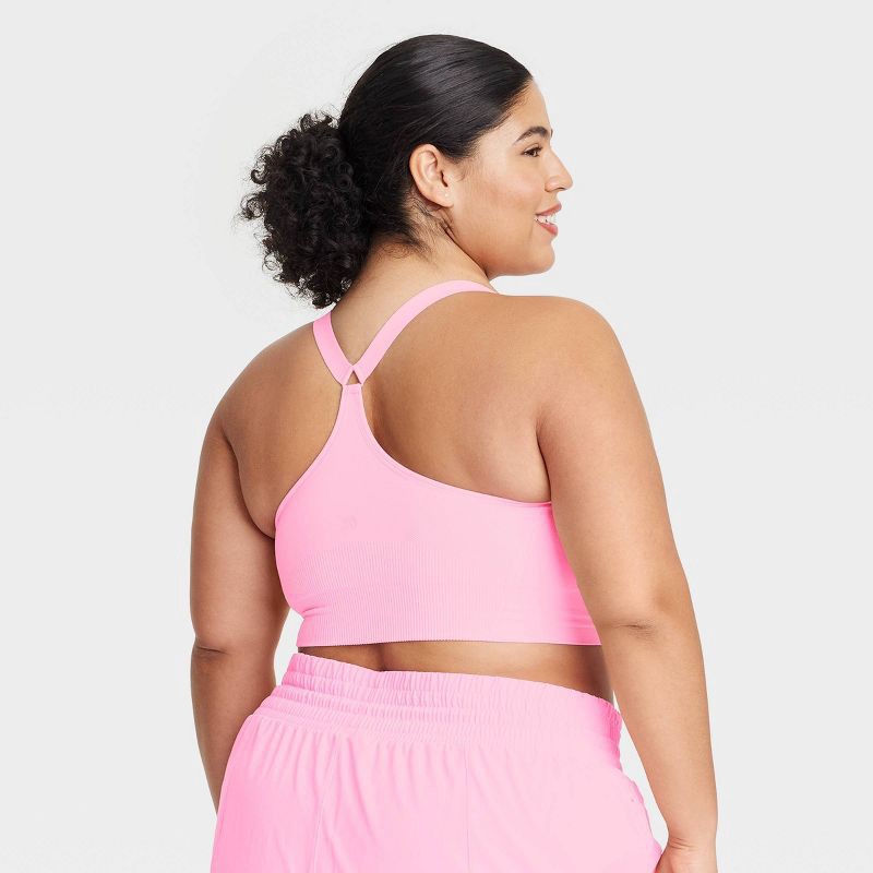 slide 2 of 3, Women's Seamless Medium Support Cami Sports Bra - All In Motion™ Light Pink XXL: Racerback, Removable Cups, 1 ct