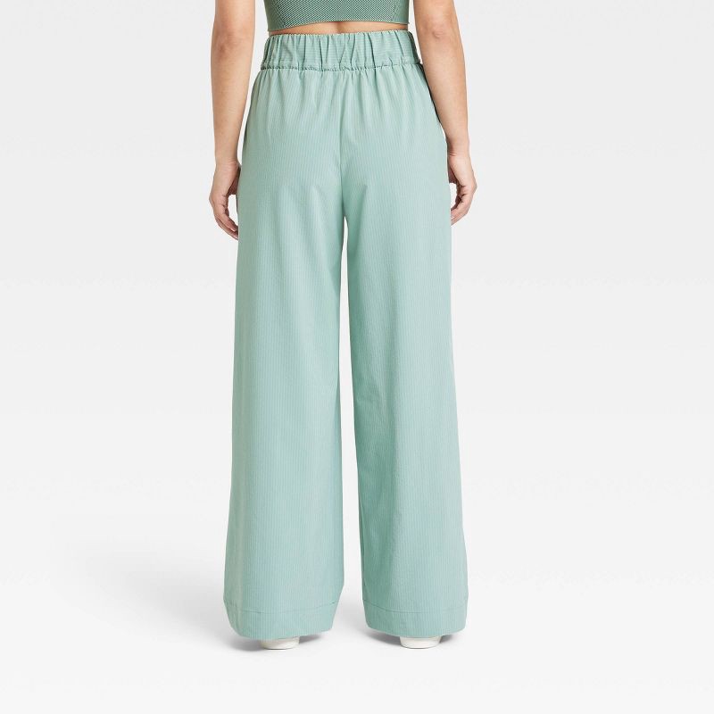 slide 2 of 3, Women's Woven High-Rise Seersucker Wide Leg Pants - All In Motion™ Olive Green L: Recycled Polyester, Spandex, Moisture Wicking, Quick Dry, 1 ct
