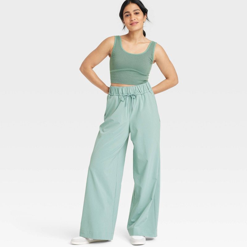 slide 3 of 3, Women's Woven High-Rise Seersucker Wide Leg Pants - All In Motion™ Olive Green L: Recycled Polyester, Spandex, Moisture Wicking, Quick Dry, 1 ct