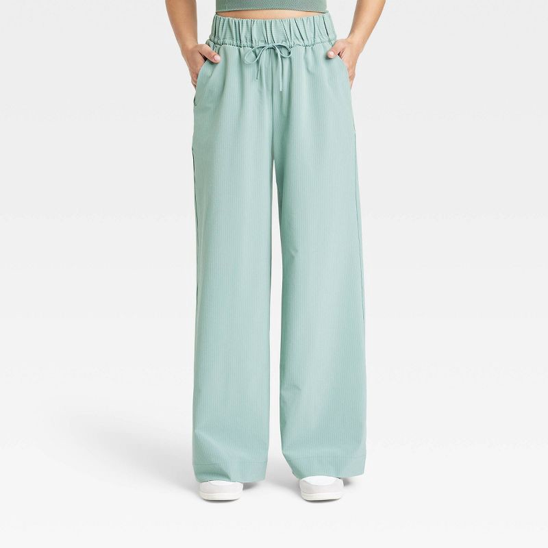 slide 1 of 3, Women's Woven High-Rise Seersucker Wide Leg Pants - All In Motion™ Olive Green L: Recycled Polyester, Spandex, Moisture Wicking, Quick Dry, 1 ct