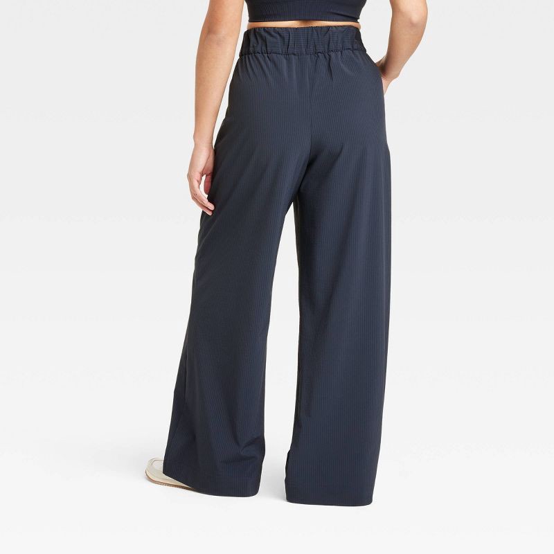 slide 4 of 5, Women's Woven High-Rise Seersucker Wide Leg Pants - All In Motion™ Navy Blue L: Recycled Polyester, Spandex, Moisture Wicking, Quick Dry, 1 ct