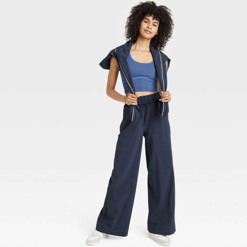 slide 5 of 5, Women's Woven High-Rise Seersucker Wide Leg Pants - All In Motion™ Navy Blue L: Recycled Polyester, Spandex, Moisture Wicking, Quick Dry, 1 ct