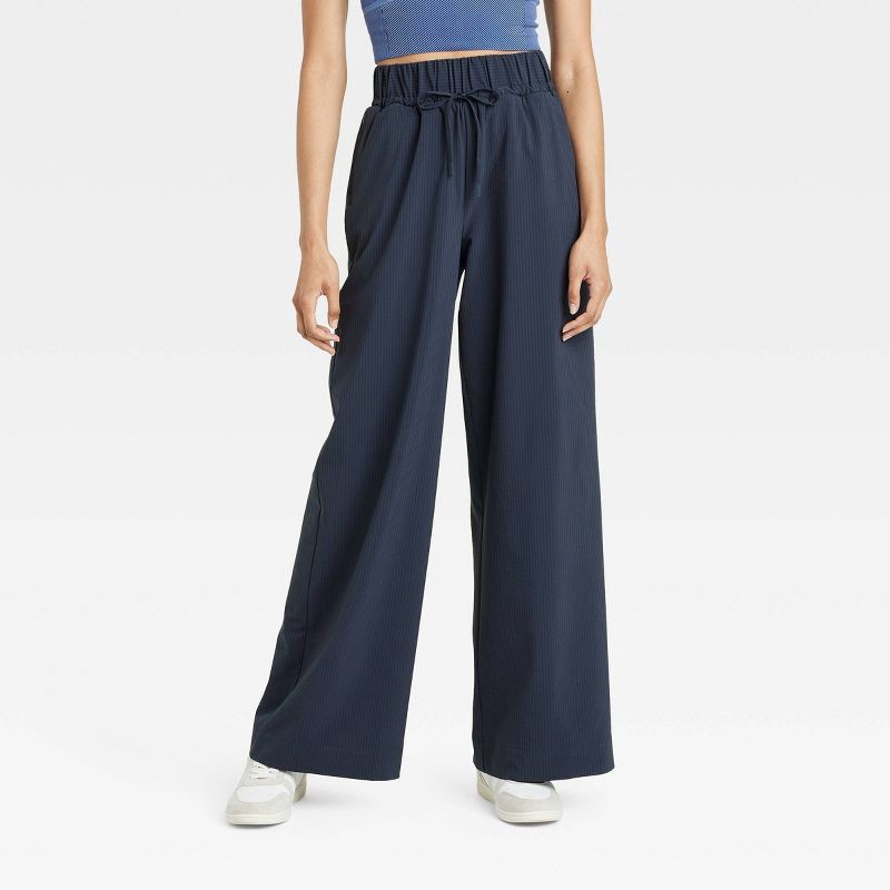 slide 1 of 5, Women's Woven High-Rise Seersucker Wide Leg Pants - All In Motion™ Navy Blue L: Recycled Polyester, Spandex, Moisture Wicking, Quick Dry, 1 ct