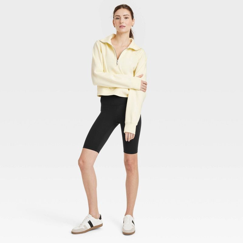 slide 5 of 5, Women's Dynamic Flex High-Rise Bike Shorts 10" - All In Motion™ Black XS: Moisture Wicking, Quick Dry, UPF 50+, Hidden Pocket, 1 ct