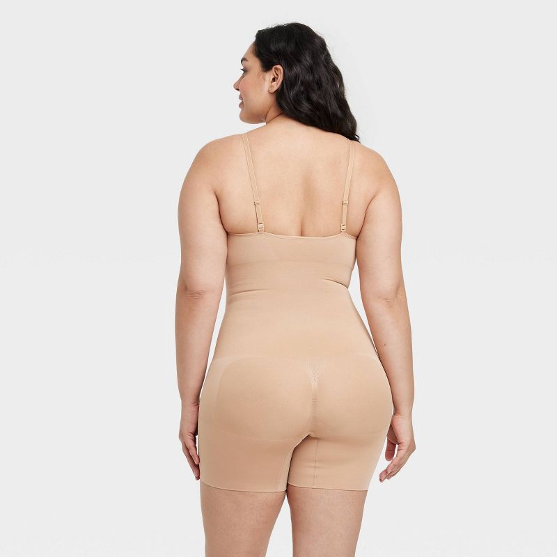 slide 5 of 6, Women's Medium Shaping Seamless Mid-Thigh Bodysuit - Auden™ Pearl Tan S: Nylon Spandex Blend, Medium Compression, Tummy & Thigh Slimming, 1 ct