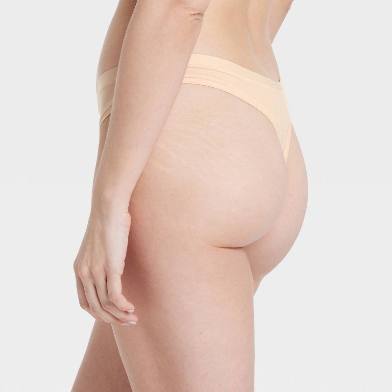 slide 2 of 5, Women's Luxe Stretch Thong Underwear - Auden™ Soft Beige L: Low Rise, Cotton Gusset, Comfort Elastic, 1 ct