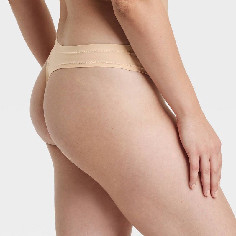 slide 5 of 5, Women's Luxe Stretch Thong Underwear - Auden™ Soft Beige L: Low Rise, Cotton Gusset, Comfort Elastic, 1 ct