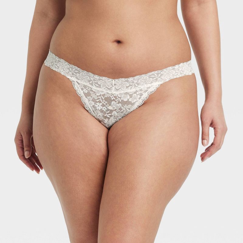 slide 4 of 7, Women's New Allover Lace Thong Underwear - Auden™ White L: Mid Rise, Cotton Gusset, Lightweight Fabric, 1 ct