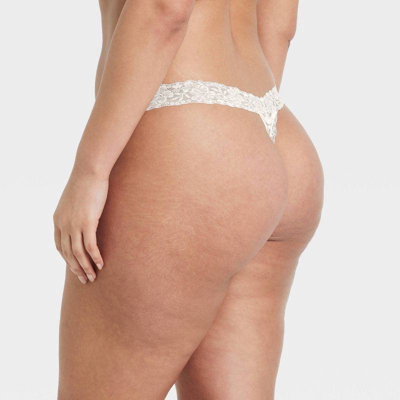 slide 5 of 7, Women's New Allover Lace Thong Underwear - Auden™ White XL: Mid Rise, Pull-On, Cotton Gusset, 1 ct