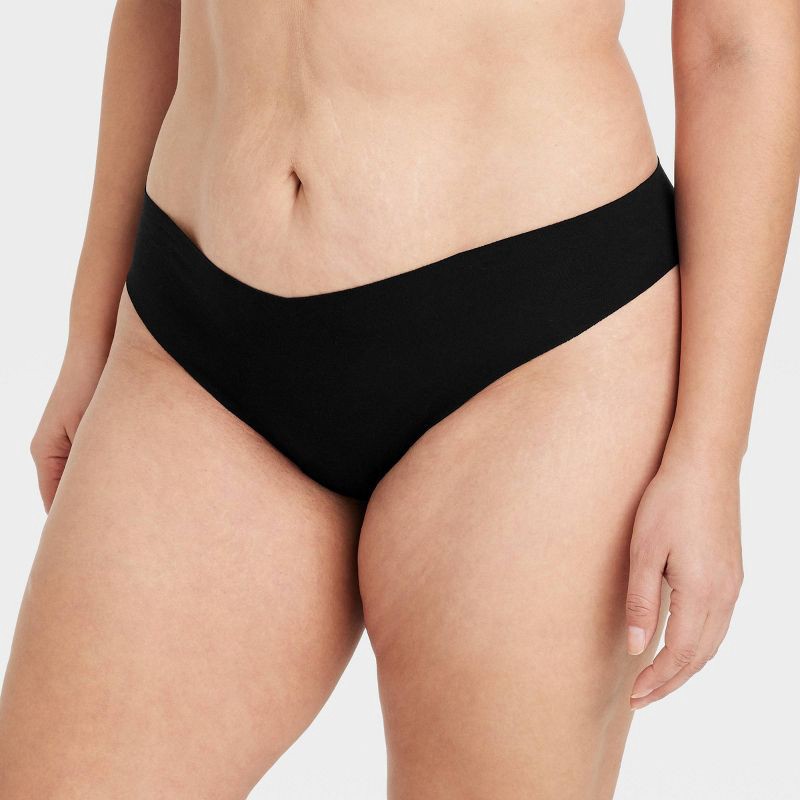 slide 4 of 5, Women's Invisible Edge Cotton Thong Underwear - Auden™ Black M: Seamless, Low Rise, Midweight Fabric, 1 ct