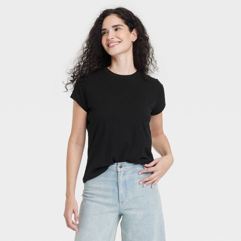 slide 1 of 4, Women's Short Sleeve Crewneck T-Shirt - Universal Thread™ Black XL: 100% Cotton, Relaxed Fit, Crew Neck, Jersey Fabric, Machine Washable, 1 ct