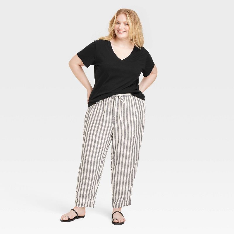 slide 3 of 4, Women's Short Sleeve V-Neck T-Shirt - Universal Thread™ Black XXL: Relaxed Fit, Pullover, Jersey, At Hip Length, 1 ct