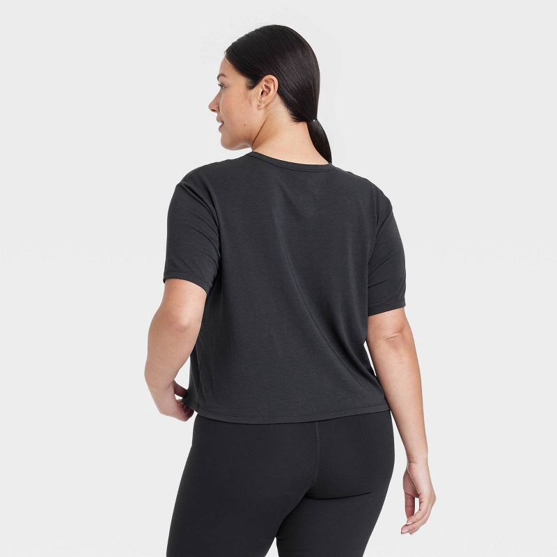 slide 4 of 5, Women's Crewneck Short Sleeve T-Shirt - All In Motion™ Black M: Moisture Wicking, Quick Dry, Loose Fit, 1 ct