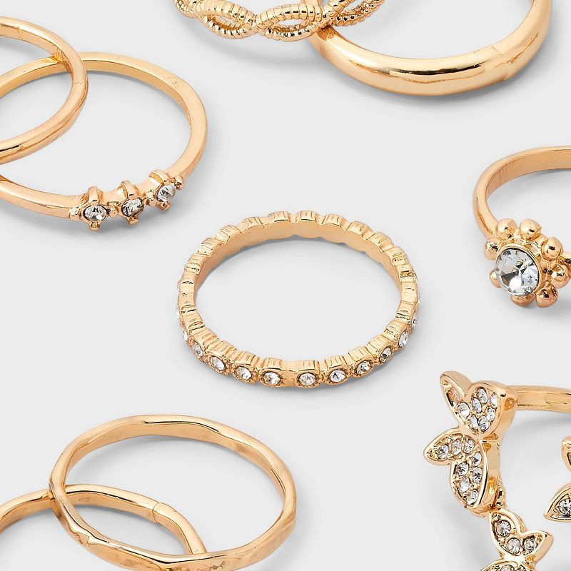 slide 3 of 3, Crystal Floating Butterfly Ring Set 8pc- Wild Fable™ Gold: Stacking Rings, Recycled Zinc, Sizes 6-8, 8 ct