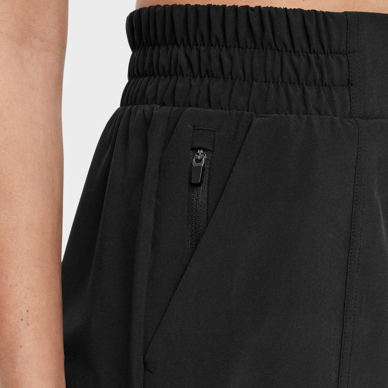 slide 6 of 6, Women's Woven Mid-Rise Shorts 4" - All In Motion™ Black XS: Lightweight, Quick-Dry, 4-Way Stretch, UPF 50+ Bottoms, 1 ct