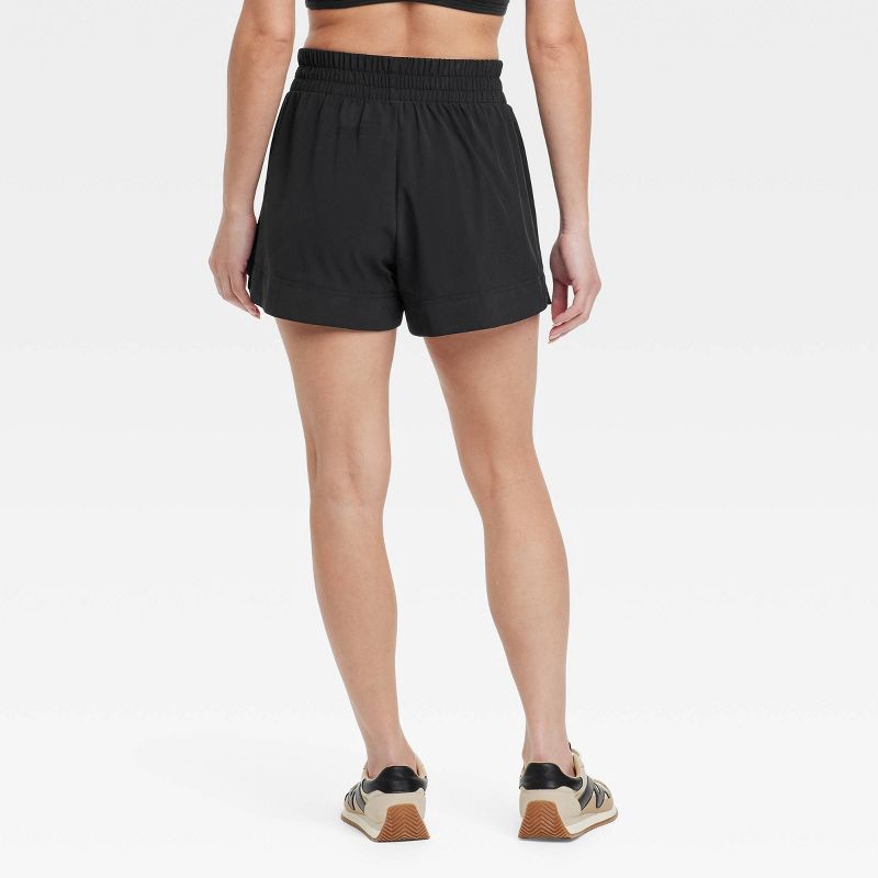 slide 2 of 6, Women's Woven Mid-Rise Shorts 4" - All In Motion™ Black L: Lightweight, Moisture-Wicking, Quick-Dry, 4-Way Stretch, UPF 50+, 1 ct