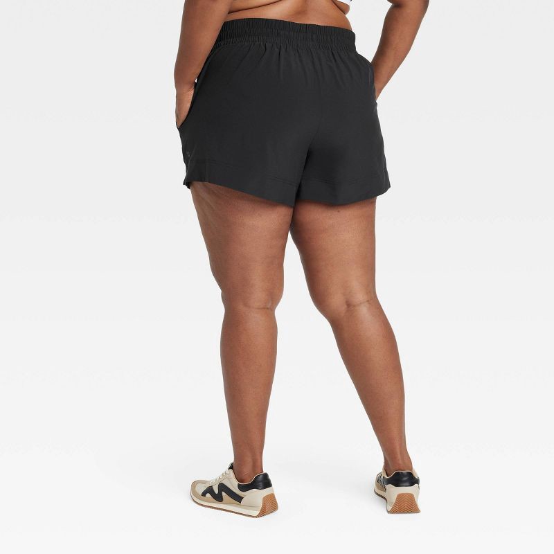 slide 2 of 3, Women's Woven Mid-Rise Shorts 4" - All In Motion™ Black XXL: Lightweight, Moisture-Wicking, Quick-Dry, 4-Way Stretch, UPF 50+, 1 ct