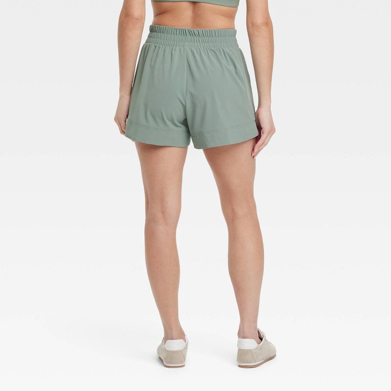 slide 2 of 6, Women's Woven Mid-Rise Shorts 4" - All In Motion™ Sage Green M: Lightweight, Moisture Wicking, UPF 50+, 1 ct