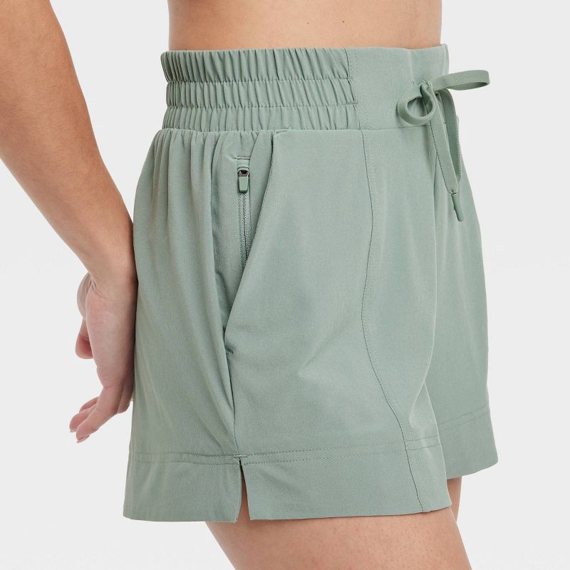 slide 6 of 6, Women's Woven Mid-Rise Shorts 4" - All In Motion™ Sage Green M: Lightweight, Moisture Wicking, UPF 50+, 1 ct