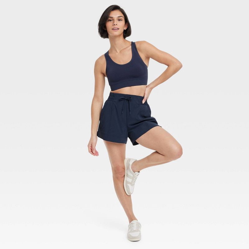 slide 4 of 5, Women's Woven Mid-Rise Shorts 4" - All In Motion™ Navy Blue L: Lightweight, Moisture Wicking, UPF 50+, 1 ct