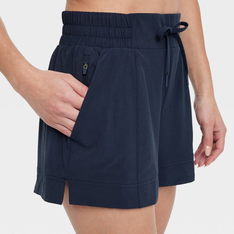 slide 5 of 5, Women's Woven Mid-Rise Shorts 4" - All In Motion™ Navy Blue L: Lightweight, Moisture Wicking, UPF 50+, 1 ct