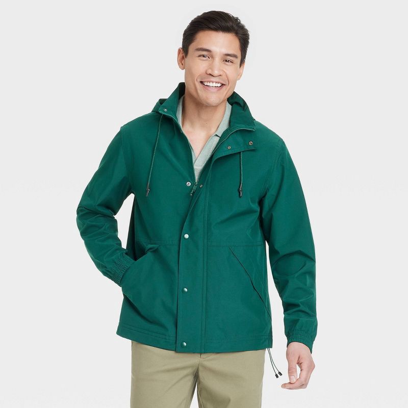 slide 1 of 3, Men's Hooded Rain Coat - Goodfellow & Co™ Green L: Wind-Resistant, Lightweight, Ripstop Fabric, Elastic Cuffs, 1 ct