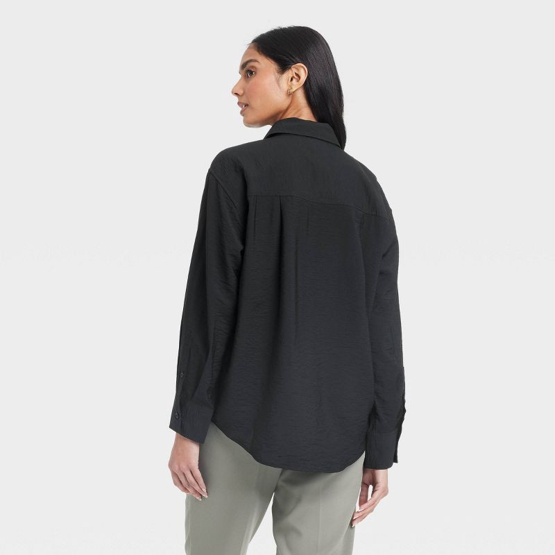 slide 2 of 3, Women's Oversized Long Sleeve Crinkle Button-Down Shirt - A New Day™ Black M: Lightweight Rayon Nylon Blend, Front Placket, 1 ct