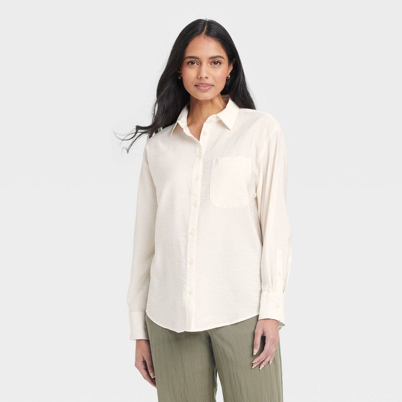 slide 1 of 3, Women's Oversized Long Sleeve Crinkle Button-Down Shirt - A New Day™ Cream S: Rayon-Nylon Blend, Poplin Fabric, 1 ct